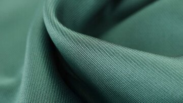 La bancarotta di questa azienda potrebbe mettere in crisi un tessuto che tutti indossiamo (senza saperlo)