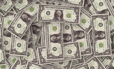 La contrazione delle riserve in dollari: primo sintomo di una lenta de-dollarizzazione?