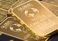 Prezzo dell'oro in discesa. Le nuove previsioni degli analisti in vista della Fed