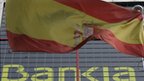 Spanish flag and Bankia branch